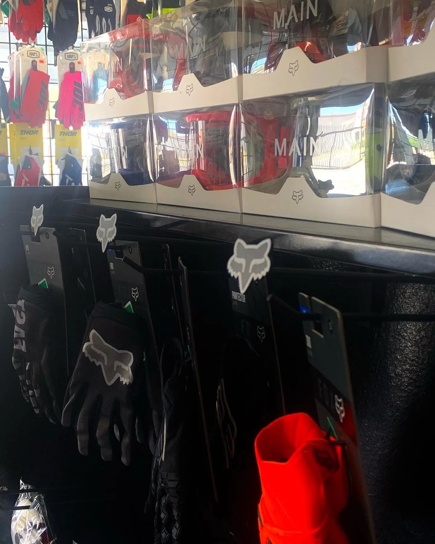 Rear wall with gloves and goggles
